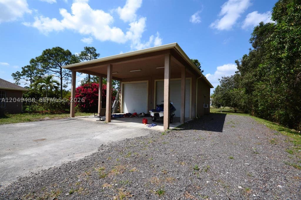 Photo of 17569 N 89th Pl N, Loxahatchee, FL 33470 (MLS # A12049488)
