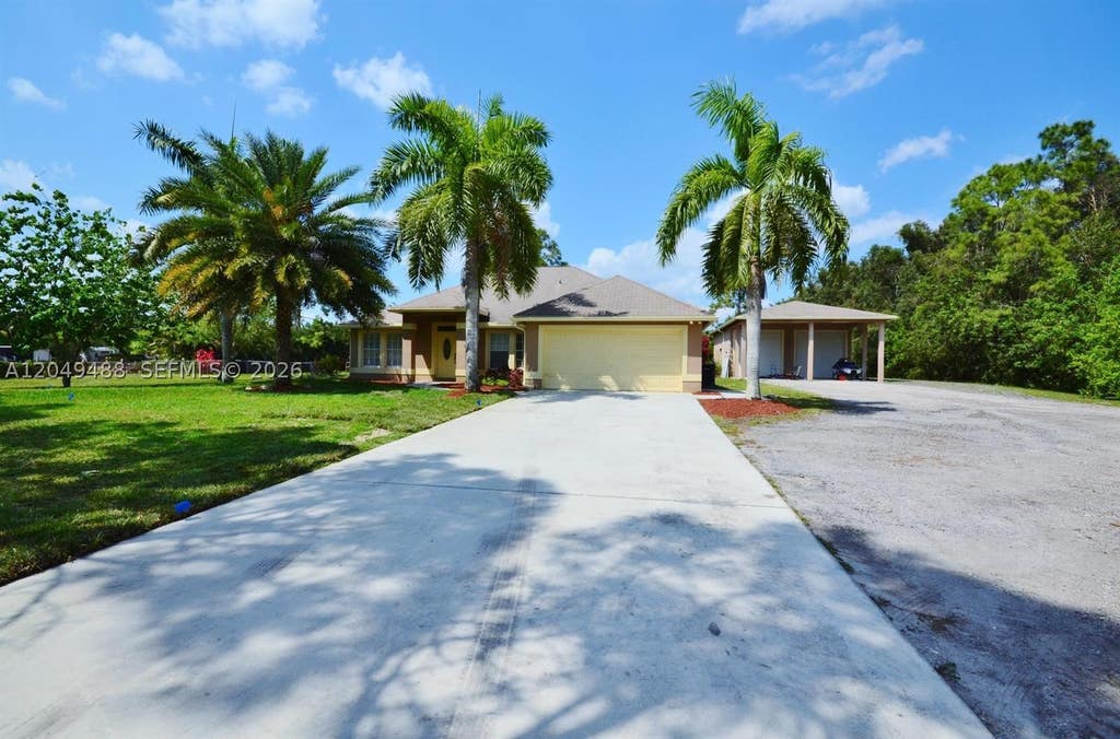 Photo of 17569 N 89th Pl N, Loxahatchee, FL 33470 (MLS # A12049488)
