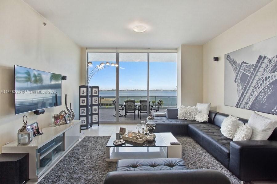 Experience the luxury of a 600-square-foot private terrace with breathtaking water views. This rarely available
rental unit features 10-foot ceilings throughout. It includes two bedrooms and a spacious den with a closet, which
is being used as a third bedroom. The unit comes with two dedicated parking spaces. Cable, internet and water
included. Building amenities include a renovated pool and gym, 24-hour security, and a clubhouse. Located in a
prime area, you’ll be close to South Beach, Downtown Miami, Aventura, and major highways. This unit is available
for rent furnished.