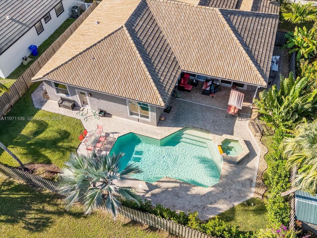 Photo of 2221 NW 129th Ter, Pembroke Pines, FL 33028 (MLS # A11971109)