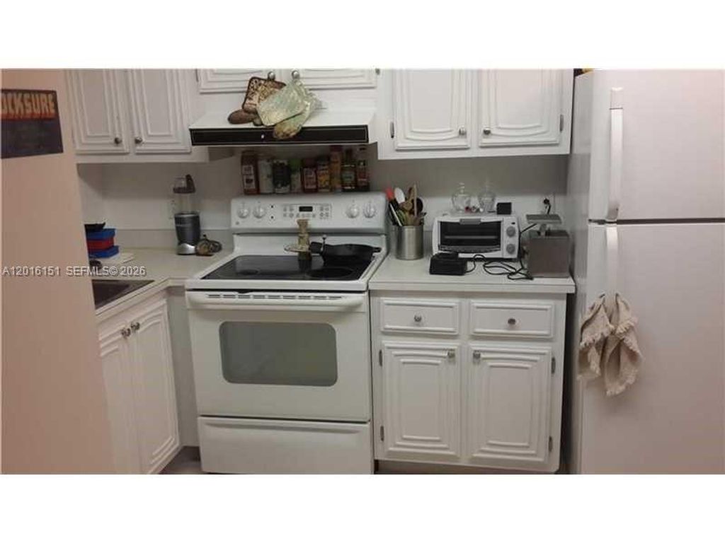 Photo of 119 Royal Park Dr #1E, Oakland Park, FL 33309 (MLS # A12016151)