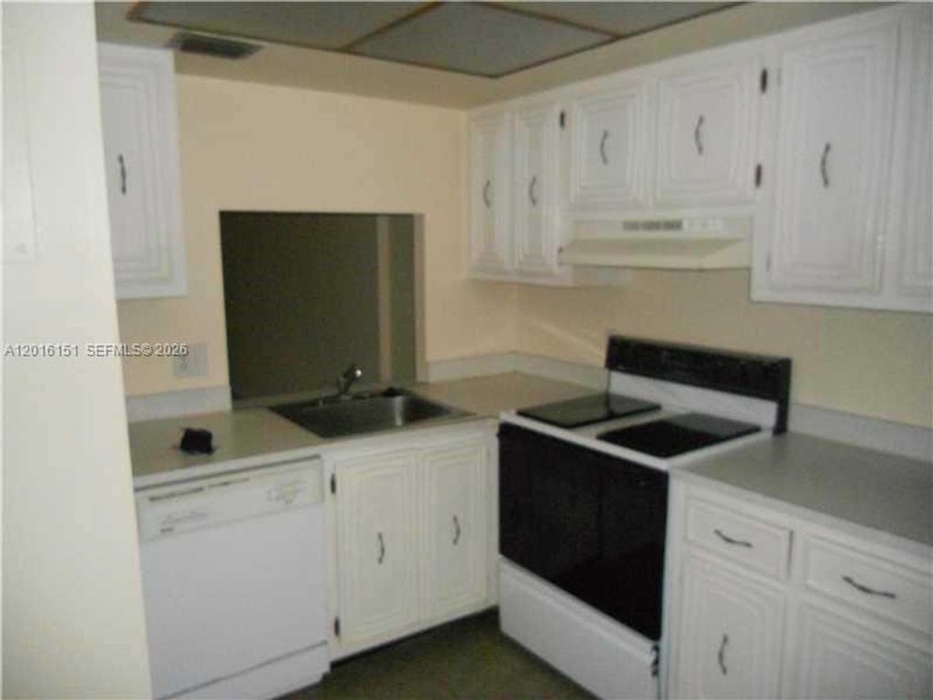 Photo of 119 Royal Park Dr #1E, Oakland Park, FL 33309 (MLS # A12016151)