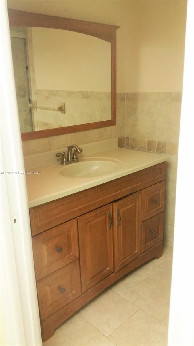 This spacious 2/2 in very sought after over 55 community of Carriage Hills will not last. This is priced for a quick sell. The community offers just about everything you would want including, heated pool , sauna, steam room, exercise room, jacuzzi, bbq area, and lots more! Both bathrooms have been updated, the master bedroom has 2 closets, a walk in closet and a regular closet. laminate flooring in social areas and one bedroom. There is lot of guest parking near this unit because it is near the clubhouse. There is a screened patio going out to an open grassy area, giving it a tranquil feel. Washer, dryer and storage unit on second floor. 650 or higher credit score necessary. Centrally located near shopping , schools and bus routes.