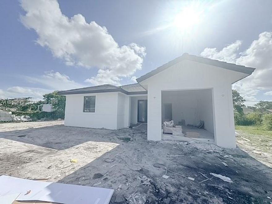 New construction in Miami Gardens. Spacious one-story home featuring 4 bedroom 3 bath + one car garage on an oversize 11370 sq ft. lot. Layout offering generous living space and modern comfort. Spacious kitchen with stainless steel appliances, wood cabinetry and quartz counter-tops. Impact windows and doors. Porcelain tile flooring throughout. Property estimated to be completed by July 2026.