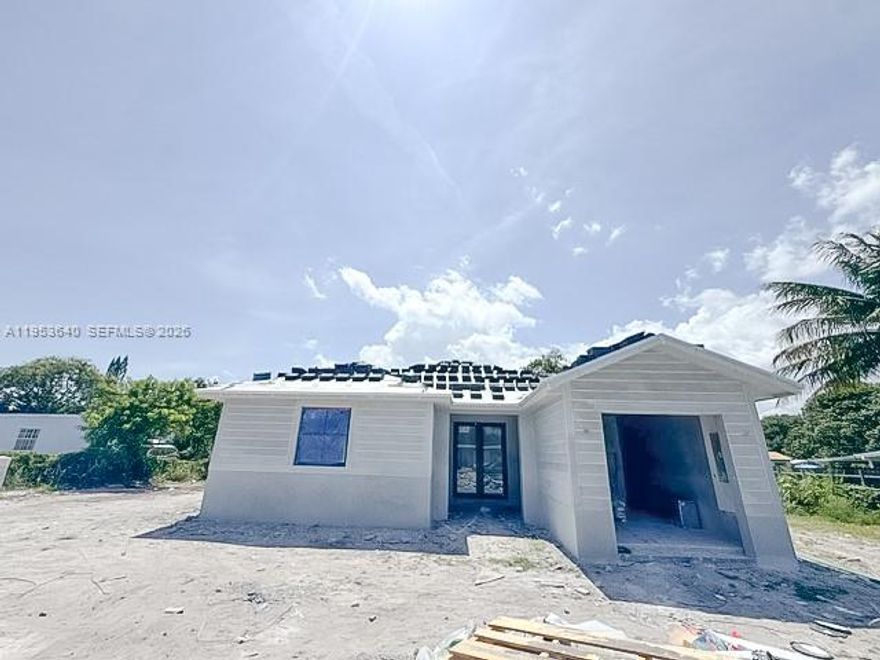 New construction in Miami Gardens. Spacious one-story home featuring 4 bedroom 3 bath + one car garage on an oversize 11370 sq ft. lot. Layout offering generous living space and modern comfort. Spacious kitchen with stainless steel appliances, wood cabinetry and quartz counter-tops. Impact windows and doors. Porcelain tile flooring throughout. Property estimated to be completed by July 2026.