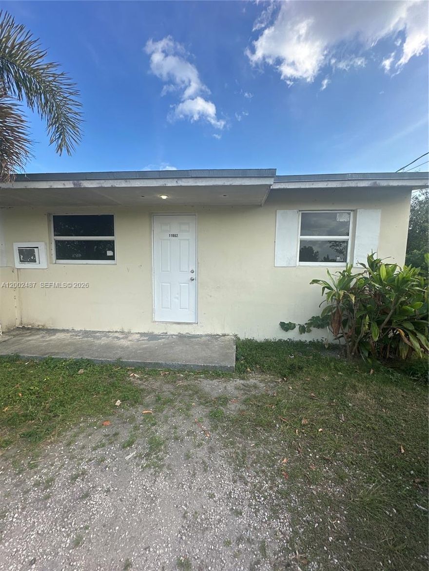 comfortable two bedroom one bathroom duplex unit with own driveway and entrance from the street. centrally located near US1. unit comes with refrigerator, stove and ac units. washer and dryer hook ups provided. large communal yard. asking for first month and one month security deposit.