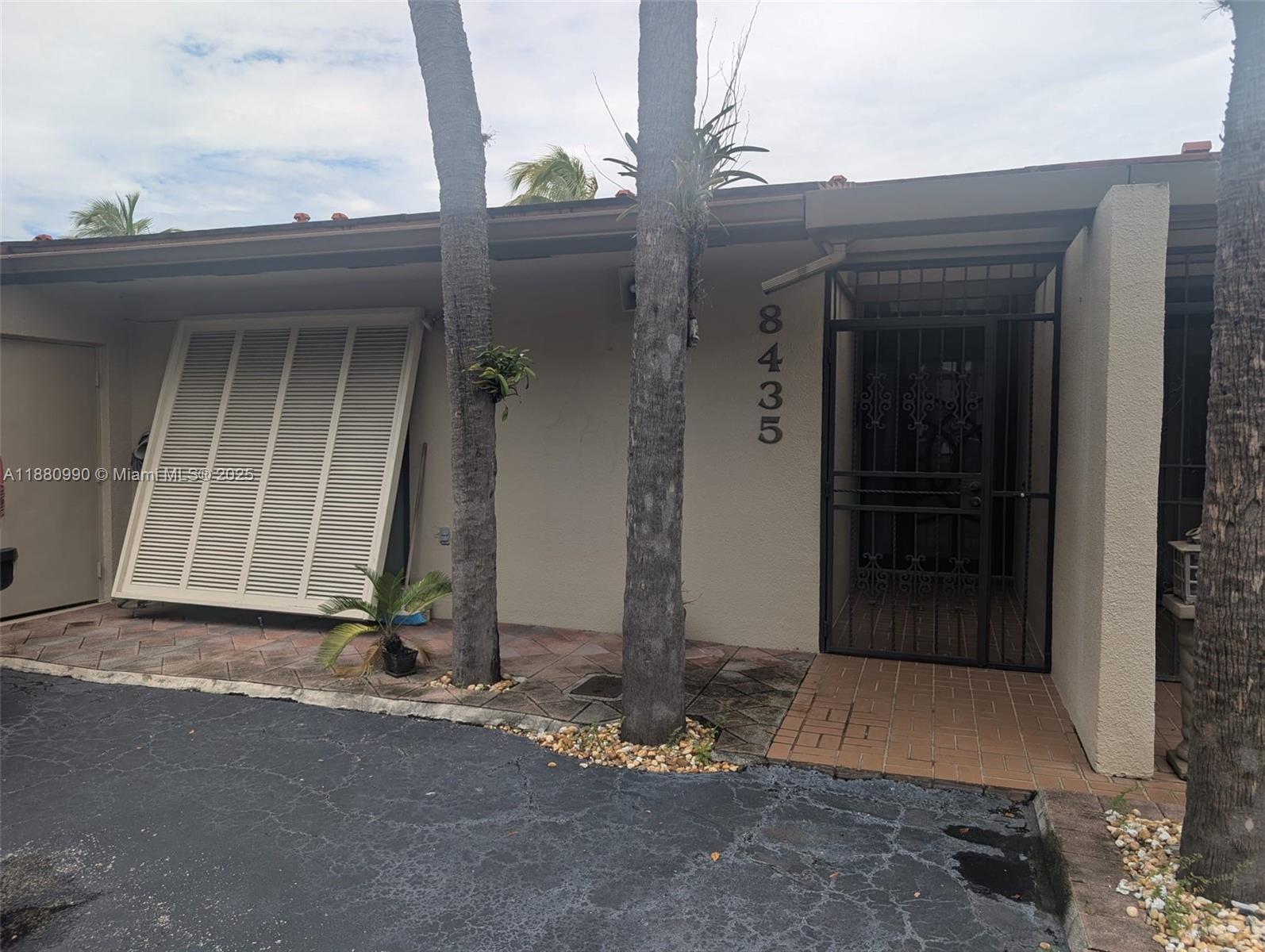 WATERFRONT ONE STORY TOWNHOUSE IN A GATED COMMUNITY with A-rated schools. Renovated 3 bedroom 2 bathroom in the heart of Miami Lakes. New impact glass front door and accordion hurricane shutters on all sliding glass doors for protection. Features include an Updated kitchen with granite counter tops and stainless steel appliances. Renovated bathrooms with new vanities. Ample parking which can accommodate up to 3 cars. The residence is tiled throughout. Outside you will find a large screened covered patio perfect for entertaining family and guests. Located in top rated MAGNET- SCHOOL zone for middle school and high school.