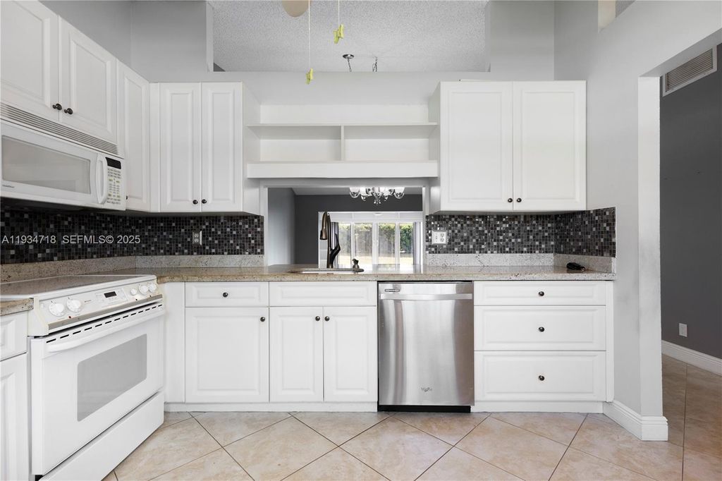 Photo of 21314 Chinaberry Dr, Boca Raton, FL 33428 (MLS # A11934718)