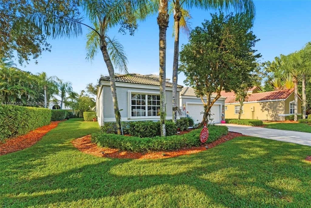 Photo of 2019 Cove Ln, Weston, FL 33326 (MLS # A11933157)