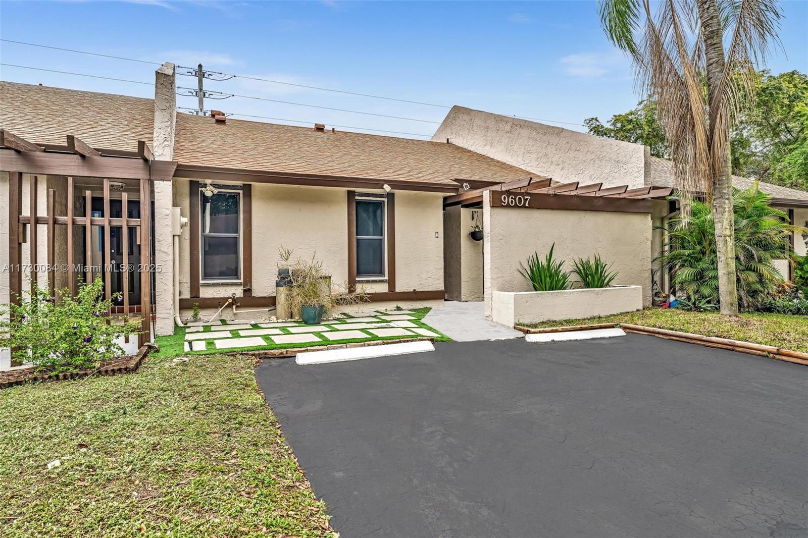 Beautifully updated 2/2 one story villa in East Lake, one of Pembroke Pines popular communities. This Villa features a beautiful kitchen with Custom Wood cabinets, quartz counter top and stainless steel appliances. Newly remodelled bathrooms. BRAND NEW Washer and Dryer. New water filtration system. NEW Impact Windows in kitchen, front door and french doors. Huge covered patio perfect for outdoor Living/Dining/Entertaining and plus 2 storage rooms. This gem is perfectly nestled near schools, shopping, restaurants, highways and much more. Amenities include childrens park, tennis courts and community pool. Low HOA fees, 1 Year HOA Fee To Be Paid & Held In Escrow. No leasing for the first 3 years, minimum credit score of 650 required. Call me today! OPEN HOUSE Sat. 1/25 at 11:00am to 1:00pm