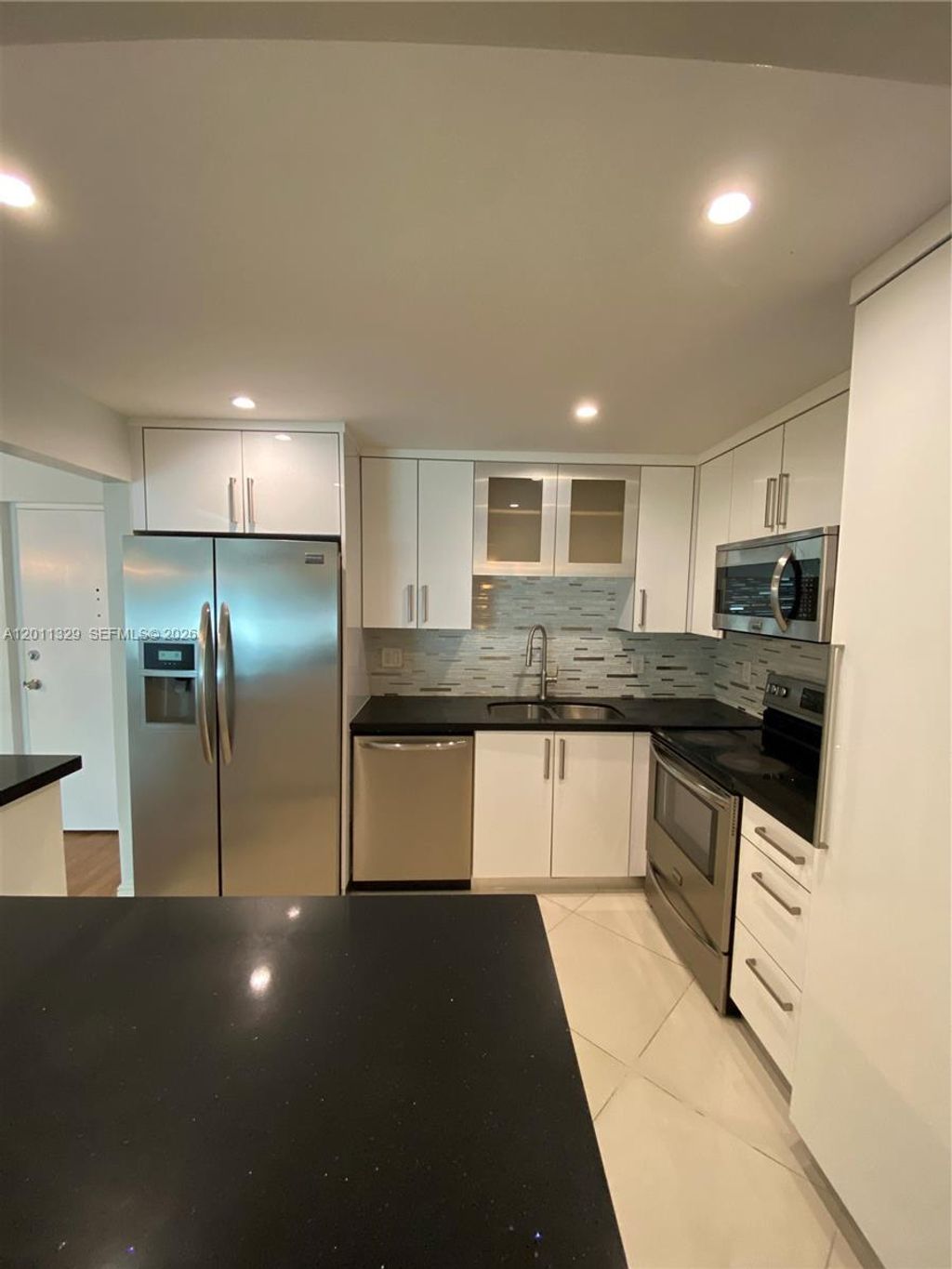 Photo of 700 SE 2nd Ave #315, Deerfield Beach, FL 33441 (MLS # A12011329)