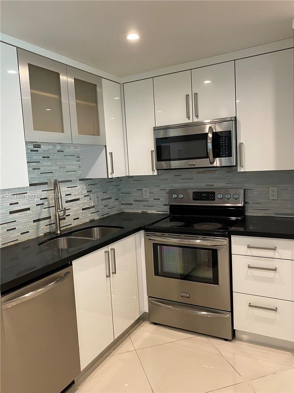 Photo of 700 SE 2nd Ave #315, Deerfield Beach, FL 33441 (MLS # A12011329)