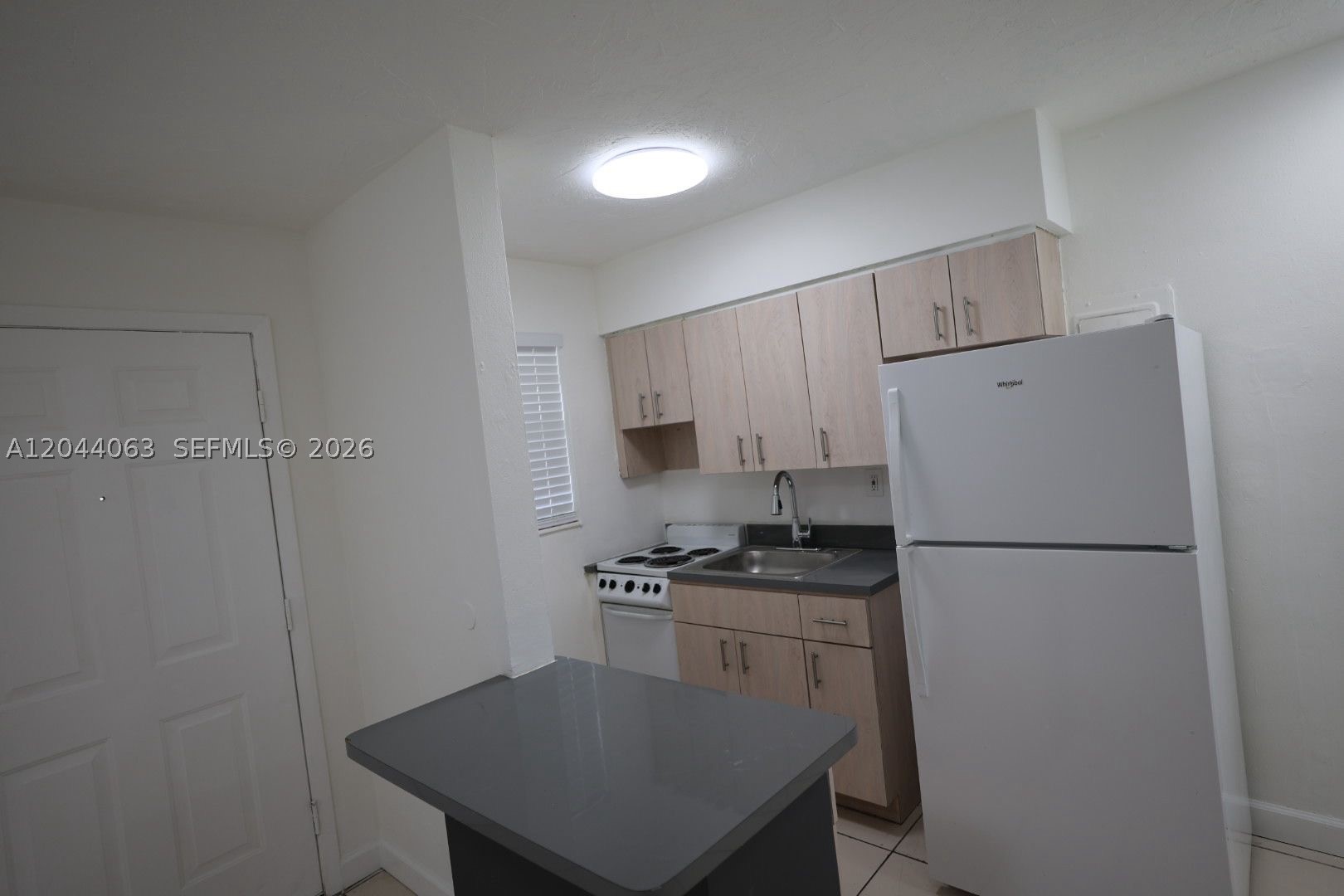 Photo 1 of 9 — 1235 W 66th St 13, Hialeah, FL 33012