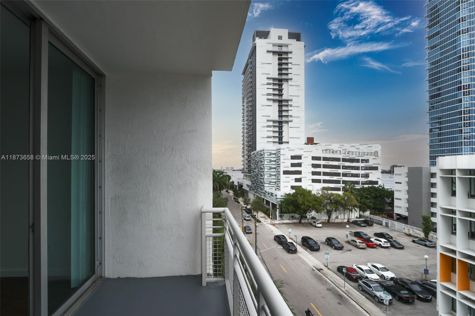 Spacious studio condo unit, 577 SF and balcony with partial bay views! Located in a boutique (69 units) building, it welcomes you to a cozy lobby secured w/face recognition, secured parking garage, pool/deck, jacuzzi, sauna, gym! Unit: studio with a walk-in closet, full bathroom with tub, modern kitchen w/granite counters and stainless steel appliances, W/D, laminate wood-floors, and floor to ceiling impact sliding doors leading to a spacious balcony overlooking the city with partial bay views. 1 assigned garage parking. Ok Corp. buyers. Rent right away. Pets allowed w/restrictions. Unbeatable location with free street parking. Maintenance fee includes reserves (SIRS + regular) to avoid future special assessments.