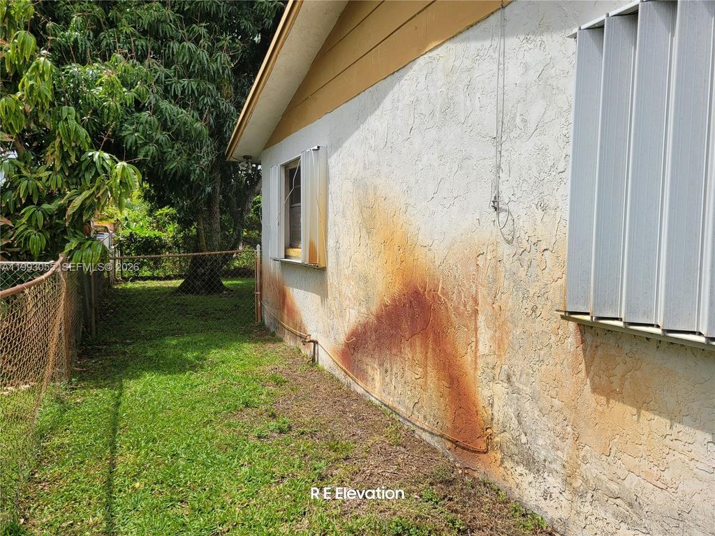 Photo of 1149 NW 45th Ave, Lauderhill, FL 33313 (MLS # A11993055)