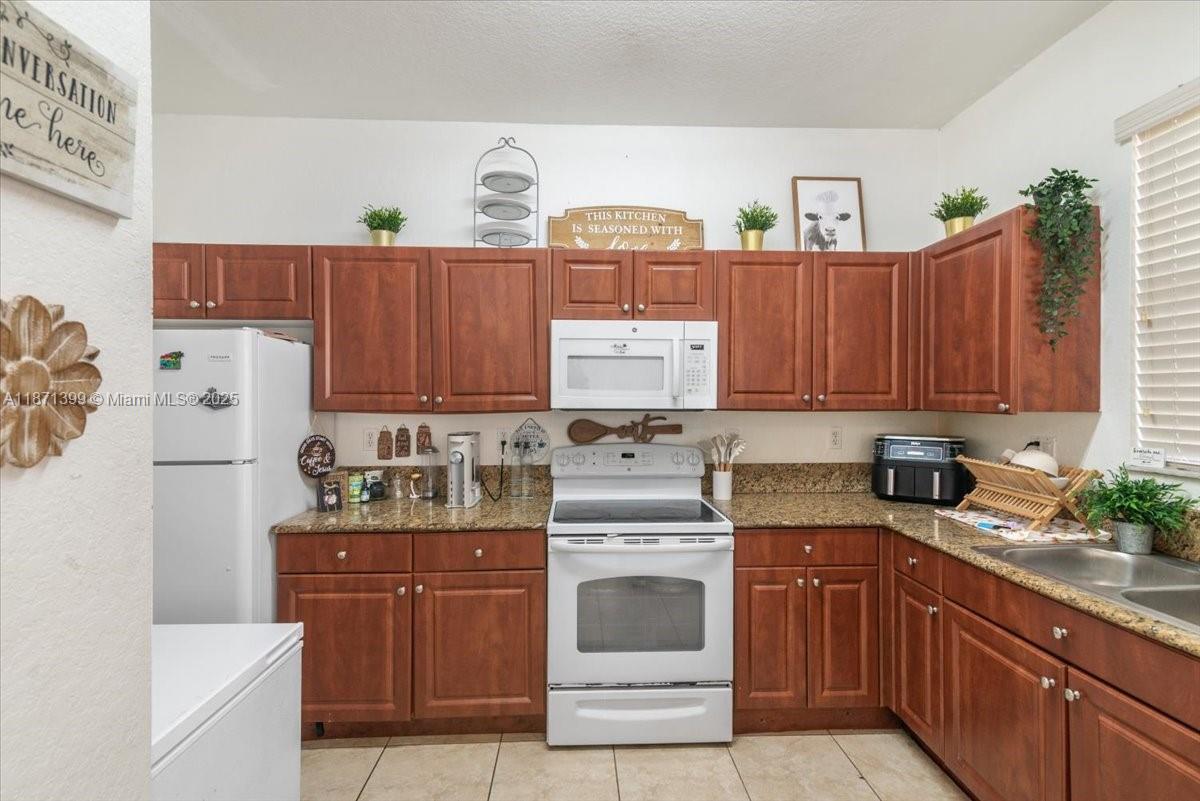 COURTS AT TUSCANY WEST - Residential