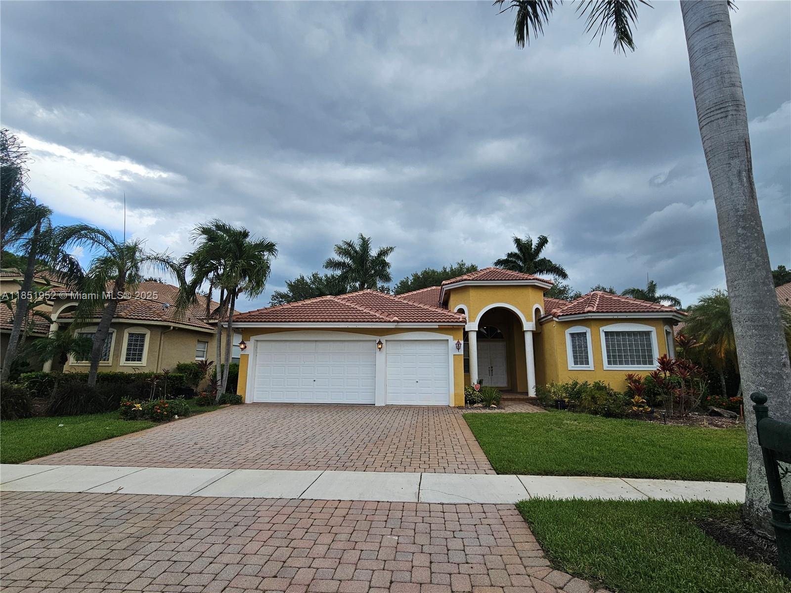 Gated single-story 5/4 3-car garage home in Vizcaya & Las Brisas in Sunset Lakes. Triple split floor plan, step-down foyer entry. Primary suite at the front features dual closets, sitting nook (ideal for office/gym), sunken tub, walk-in shower, dual vanities, glass block windows, sliding doors to the pool. On opposite side of the home, two ensuites sharing a flex space between; two bedrooms share a pool bath. Volume tray ceilings, crown molding, travertine floors throughout. Separate formal dining, living, family, and laundry rooms. Kitchen includes a double oven and built-in glass cooktop. Private fenced backyard (no rear neighbors), paver patio, pool + safety fence, mango trees. This resort-style community offers tennis, basketball, gym, playgrounds, and more. Close to I-75 & US-27.