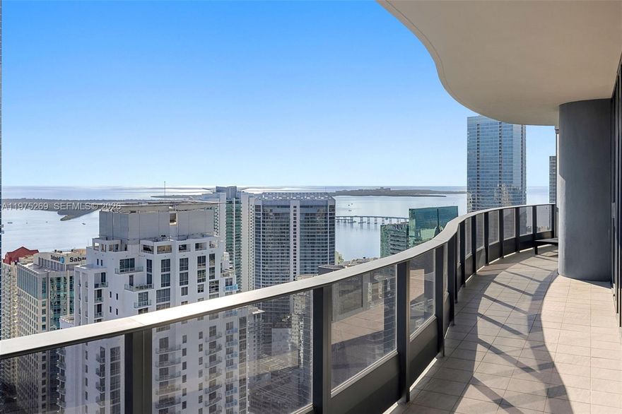 Enjoy luxury living in this spacious 3 bed + den / 3.5 bath penthouse on the 54th floor of Brickell Flatiron. This penthouse offers privacy & sweeping views of the Miami Skyline, Biscayne Bay and the Atlantic Ocean.  Features: 10-foot high floor-to-ceiling glass windows, travertine flooring, Snaidero kitchen cabinets, Miele appliances, electric shades, two entries and a full length balcony accessible from each room. The 64th floor rooftop amenities include a resort style pool area, oversized fitness center with pilates/yoga room and a private spa/relaxation area. Add'l amenities include a club room, a lap pool, movie theater, children's playroom, lounge & billiards room. 24 hour valet, concierge, doorman and security. Located next to Mary Brickell Village & Brickell City Center. Three parking spaces included.