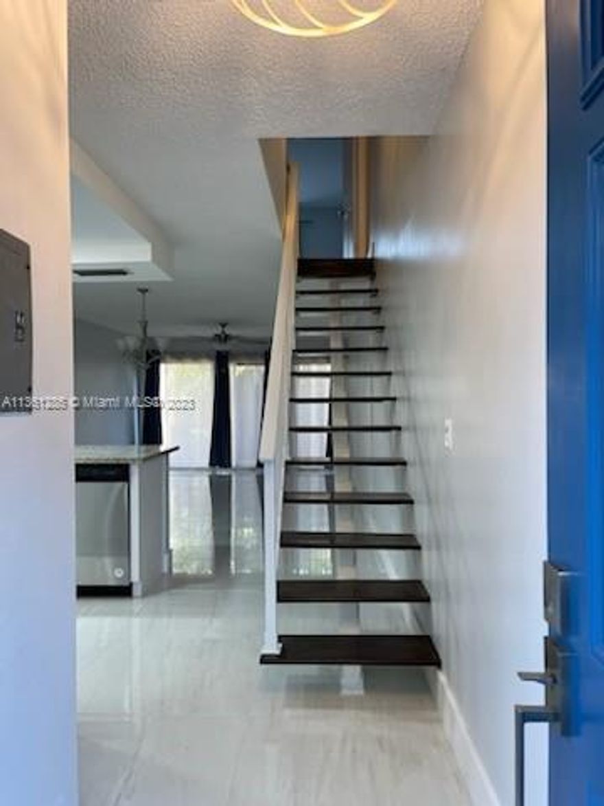 A cozy 2-bedroom unit that has been fully upgraded.  Features beautiful porcelain tile throughout, upgraded kitchen, stainless steel appliances, updated bathroom with walk-in shower, very private community with pool & clubroom.  In excellent Palmetto Bay location. Near the Falls Shopping & Turnpike & Jackson South Hospital, across from Busway. Ready for occupancy.  Easy to Show.