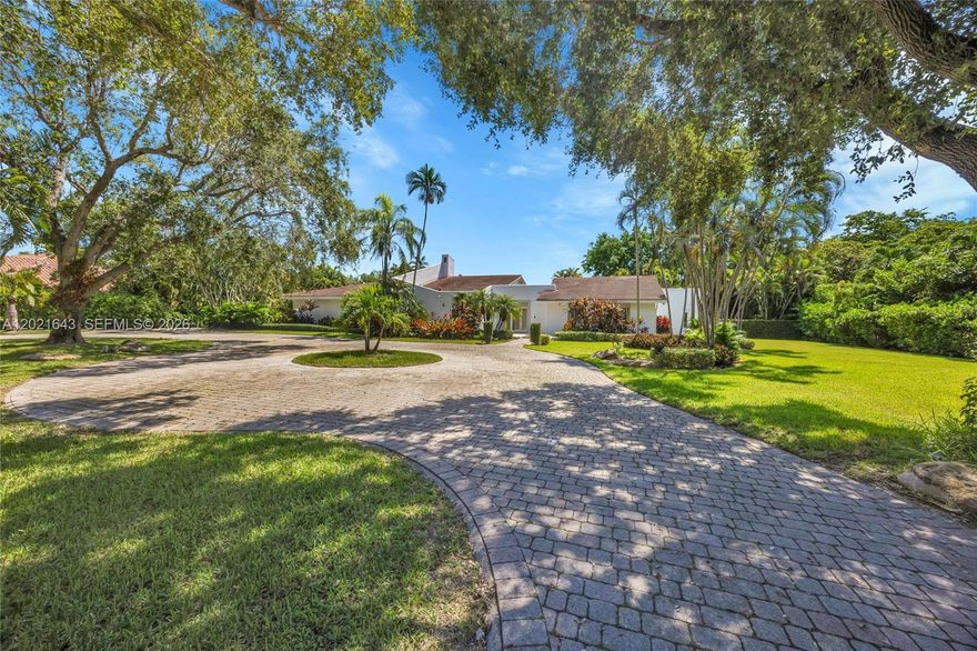 Completely renovated Coral Gables Home! Situated on a gracious 39,493 square foot lot in the prestigious South Gables this lovely home has been thoughtfully updated and is ready to be expanded or rebuilt! The 3,917 square foot home is set back from the street and features 5 bedrooms, 4.5 bathrooms, office, and gourmet kitchen with high-end appliances. The flexible floorplan offers generous living spaces in the living room, dining room, and family room overlooking the pool. Situated privately to one side of the house, the primary bedroom includes a new, spa-like bathroom and oversized closet. The home features a 2 car garage, laundry room, impact glass windows and doors, and a large covered patio.