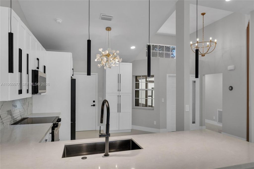 Photo of 7889 Lake Sands Dr, Delray Beach, FL 33446 (MLS # A11950077)