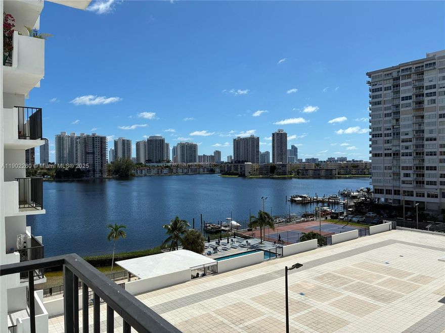 Stunning lake and ocean views from this spacious 2-bed, 2-bath condo in Aventura — all at an incredible value! Located in one of the most walkable communities east of US-1, right at the entrance to Williams Island Blvd, this residence is ready for your personal touch.
The unit comes with a covered parking space next to the entrance. 
Enjoy a well-appointed community with plenty of amenities, including extended cable, high-speed internet, hot water, pest control, water, sewer, trash, 24/7 security, and a fully fenced building. Excellent location close to shopping, dining, and top-rated schools.
A fantastic opportunity to create your dream home in Aventura.