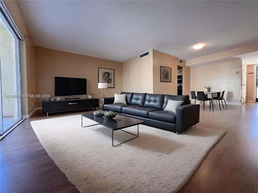 SELLER FINANCING. Stunning Two-Bedroom Apartment! Discover this beautiful two-bedroom apartment featuring a spacious living room, perfect for those who love to entertain or require a home office. This partially renovated unit offers ample living space, providing both comfort and convenience. Don't miss out on this incredible opportunity to make this stunning apartment your new home! For inquiries and to schedule a showing, contact us today.