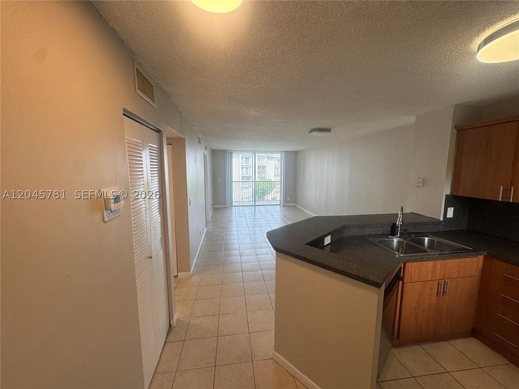 Photo of 8750 N Sherman Cir #403, Miramar, FL 33025 (MLS # A12045781)
