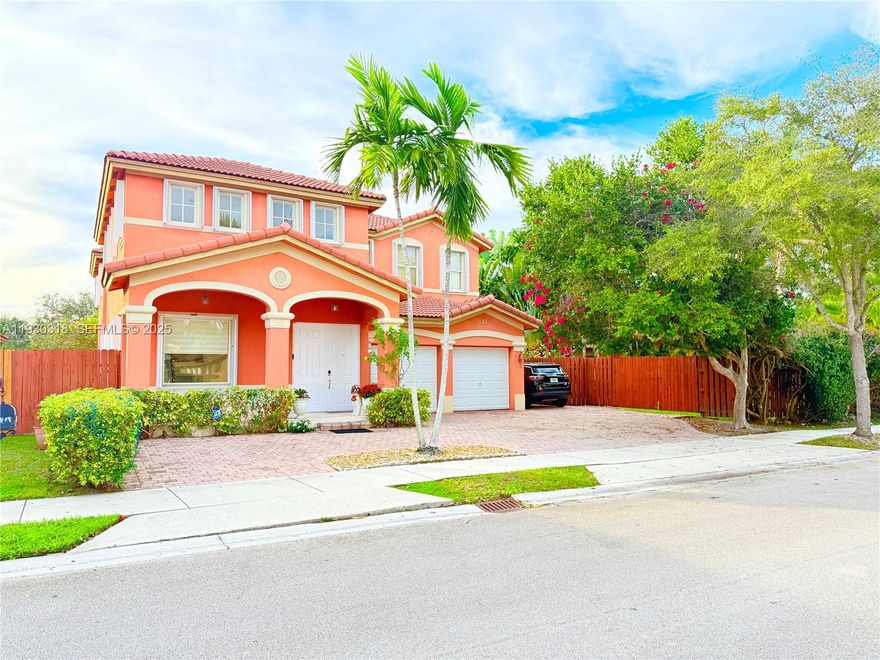 Rarely available 2-story home in The Hammocks featuring approximately 3,330 sq ft of living space with 4 bedrooms and 3 bathrooms. This floor plan offers a convenient first-floor bedroom with full bath — ideal for guests, multi-generational living or a private home office. Upstairs you’ll find a spacious primary suite with dual walk-in closets and a second-floor laundry room for maximum comfort and everyday convenience. The oversized, lush backyard is perfect for outdoor living, entertaining or future pool potential. Located in a highly desirable West Kendall location, just steps from major supermarkets and everyday amenities, in a well-maintained community with low HOA. Easy access to top schools, shopping and dining.