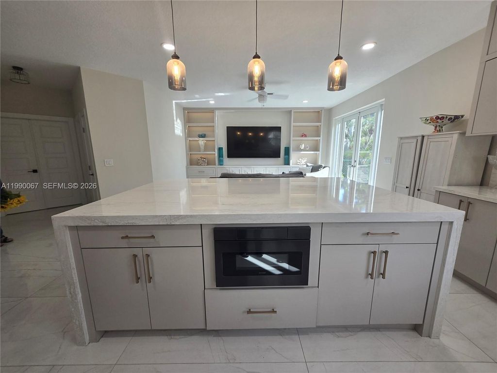 Photo of 4953 Kensington Cir, Coral Springs, FL 33076 (MLS # A11990067)