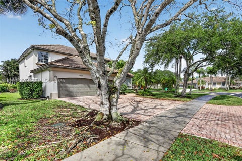 Photo of 4953 Kensington Cir, Coral Springs, FL 33076 (MLS # A11990067)