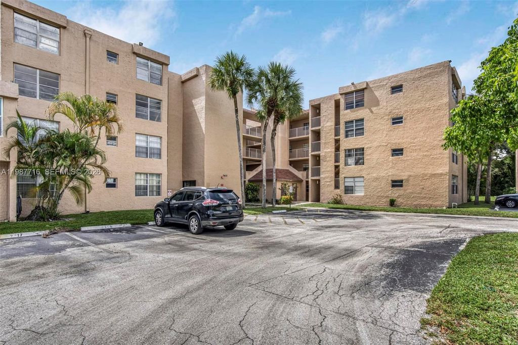 Photo of 9450 Live Oak Pl #102, Davie, FL 33324 (MLS # A11987716)