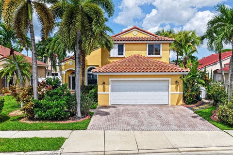 Photo of 18611 NW 11th St, Pembroke Pines, FL 33029 (MLS # A12091069)
