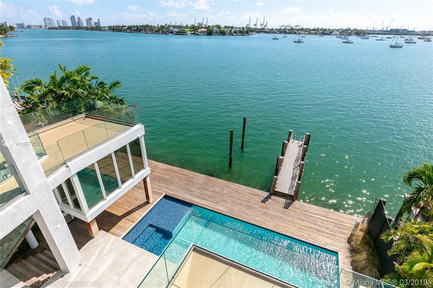 **Phenomenal Opportunity at a significantly reduced price for the right luxury buyer**

Natural light floods this truly extraordinary oversized wide waterfront residence on prestigious Venetian Island. New  home with exceptional details throughout, this home features a sleek modern open floor plan, high ceilings, large living and family room. Private elevator fully equipped gourmet kitchen, summer kitchen, private roof infinity  pool, guest house, boat dock, wide open pool with amazing intracoastal view. The two huge roof decks offers 360 degrees of stunning skylines view.