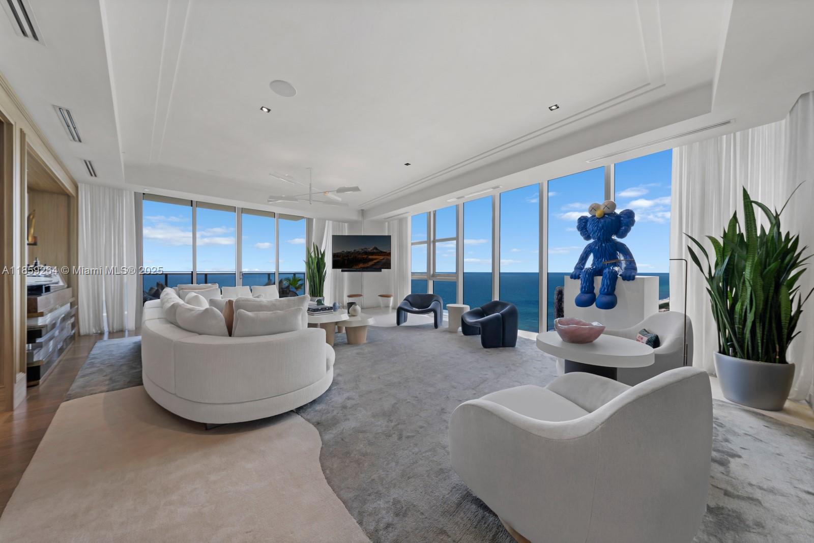 Discover luxury redefined in this stunning southeast corner penthouse at the prestigious St. Regis Bal Harbour. This ultra-rare residence boasts unobstructed views spanning South, East, & West - offering one of the most coveted vantage points in Miami. Floor-to-ceiling windows frame breathtaking ocean, bay, & city skyline views from every room. The sophisticated 3-bedroom, 3.5-bathroom residence features a chic media room & multiple balconies offering unique perspectives of paradise. With 3,884 square feet of refined living space plus 1,132 square feet of terraces, you'll have room to breathe & entertain while Premium finishes & thoughtful design elevate every corner. Building amenities include multiple restaurants, in-room dining, world-class spa, fitness center, pool & beach service.