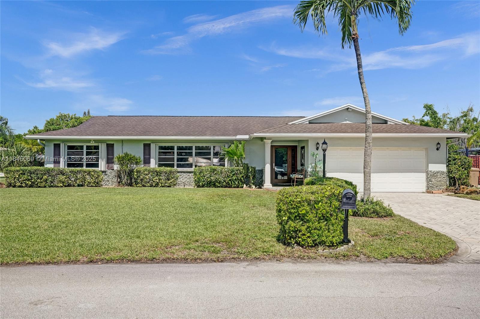 This magnificent pool home boasts 3 spacious bedrooms, 2 full baths, and a convenient 2-car garage, all within a comfortable 2,426 sqft of living space. Situated on a large corner lot just over a quarter acre, this property truly stands out with its unparalleled capacity for all your recreational vehicles and toys! The extensive pavered driveway offers an abundance of secure parking for your RV, boat, trailer, jet skis, and more! Newer roof and A/C both installed within the last 5 years. For added security and peace of mind during storm season, the front entry door and cabana bath door are hurricane-rated, complemented by accordion shutters on all remaining windows and doors. Beyond the home's impressive features, you'll love the location in a super quiet and safe neighborhood.