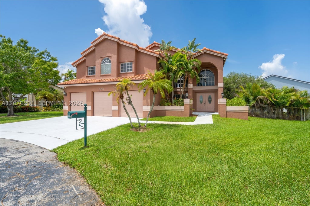Photo of 950 NW 197th Ter, Pembroke Pines, FL 33029 (MLS # A12076991)