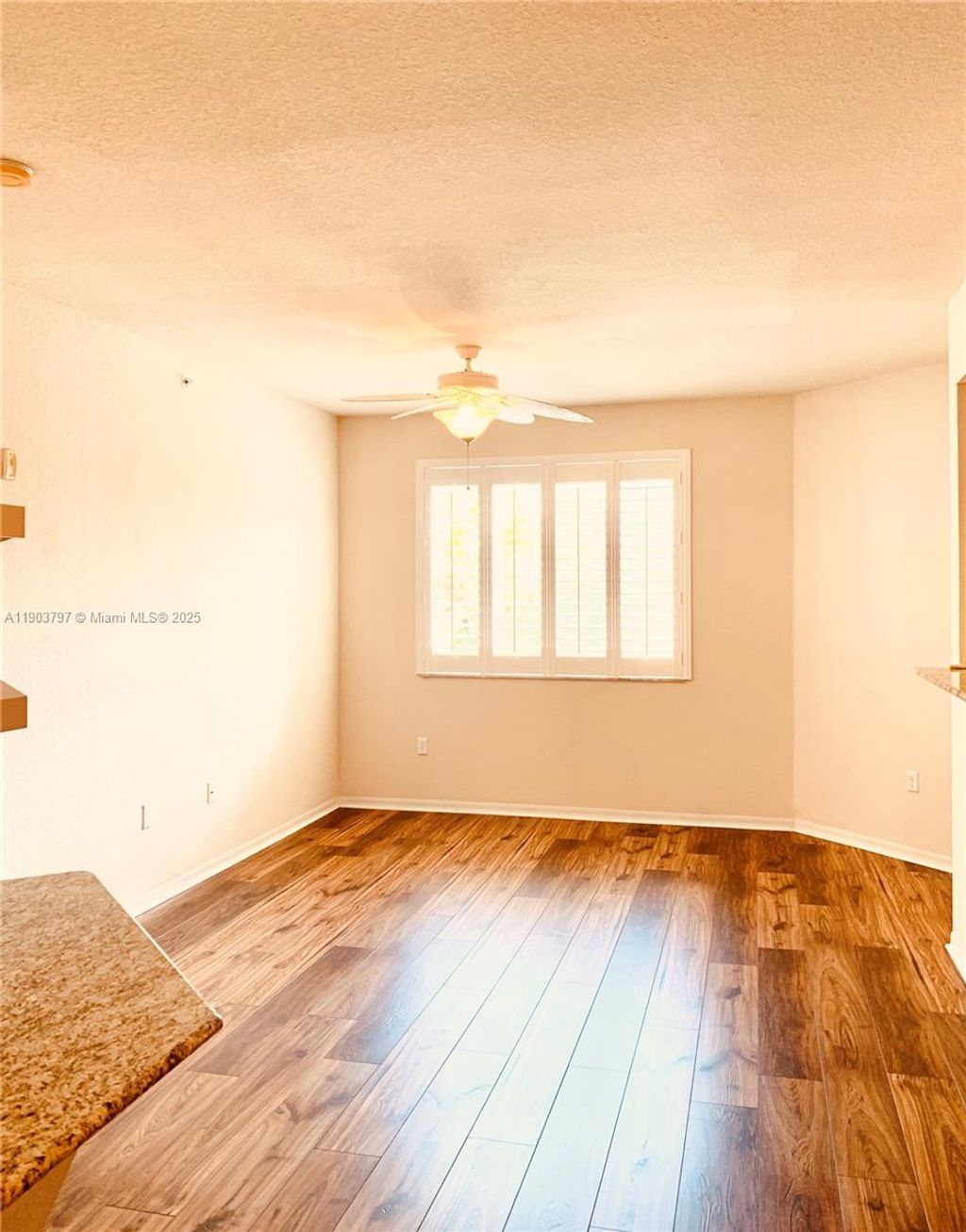 Photo of 11011 Legacy Ln #203, Palm Beach Gardens, FL 33410 (MLS # A11903797)