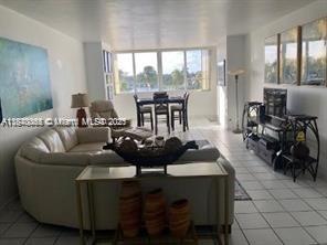 WEST EXPOSURE -WITH BALCONY VIEW! Bay & Intracoastal View ! Furnished Apt- 1 Bedroom, 1-1/2 Bathroom with Open Balcony. Eat in Kitchen, Lots of Closet Space, Tile Floors. Maintenance includes; A/C,Cable, Wi-Fi, One Assigned Parking Space+Valet Parking. Building has on site; 24-Concierge, Valet Service, Heated Swimming Pool with Deck, Pool Bathrooms, Jacuzzi, BBQ Area, Library Room and Club House. COME TAKE A LOOK! HAS OPEN BALCONY!!!