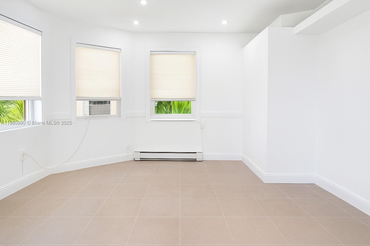 Newly Renovated 1BR – All Utilities Included! Freshly updated 1BR with new interior paint, tile throughout, modern kitchen cabinets, and a brand-new bathroom with porcelain floor-to-ceiling tile. For just $100/month extra, enjoy ALL utilities included—water, electric, AC, cable, sewer, and trash—offering unbeatable convenience and value. Located on a quiet block, minutes from State Road 7 and Hallandale Beach Blvd, close to banks, parks, shops, public transport, Aventura Mall, casinos, US1, Turnpike, and FLL Airport. $1,799/month – Includes: Water, Electric, AC, Cable, Sewer & Trash, On-site Laundry Requirements: No evictions/criminal background Income = $3,598.00/month (after taxes) No pets Fast approval. By Owner.
