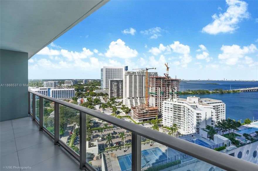 Wake up to the sunrise and enjoy amazing views of Biscayne Bay every day from your modern Miami apartment in Paraiso District! The feature-rich on-site amenities include a rooftop pool, BBQ area, tennis courts, fitness center, children's playground, and media room among others. Close to I-95 and 195 exits, live minutes from the beach, the design district, midtown, Wynwood, and Miami's Financial District and Downtown. 1 assigned parking. The unit is ready to welcome its new resident!
