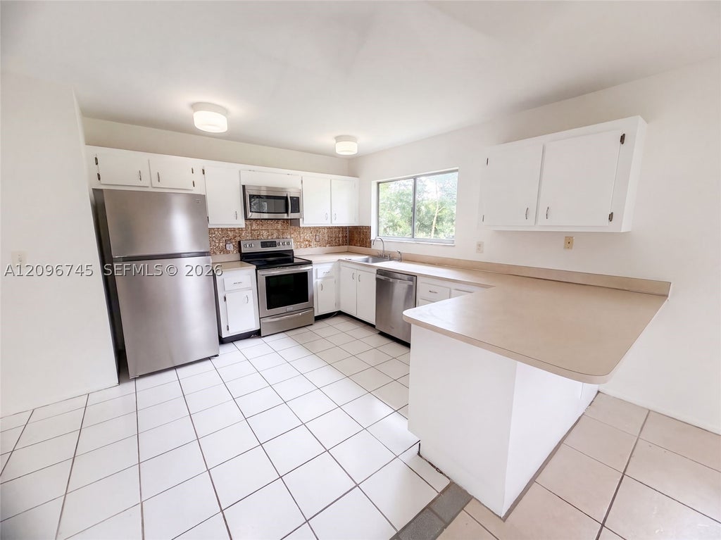 Photo of 1832 SE Wexford Ct, Port St Lucie, FL 34952 (MLS # A12096745)