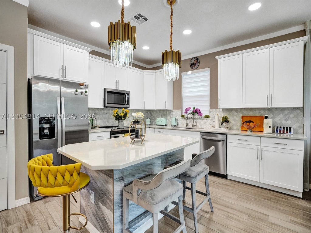 Photo of 4414 Ficus St, Hollywood, FL 33021 (MLS # A12054814)