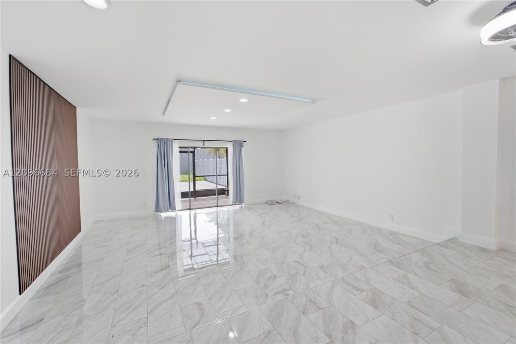 Photo of 9074 NW 35th Pl, Sunrise, FL 33351 (MLS # A12096684)