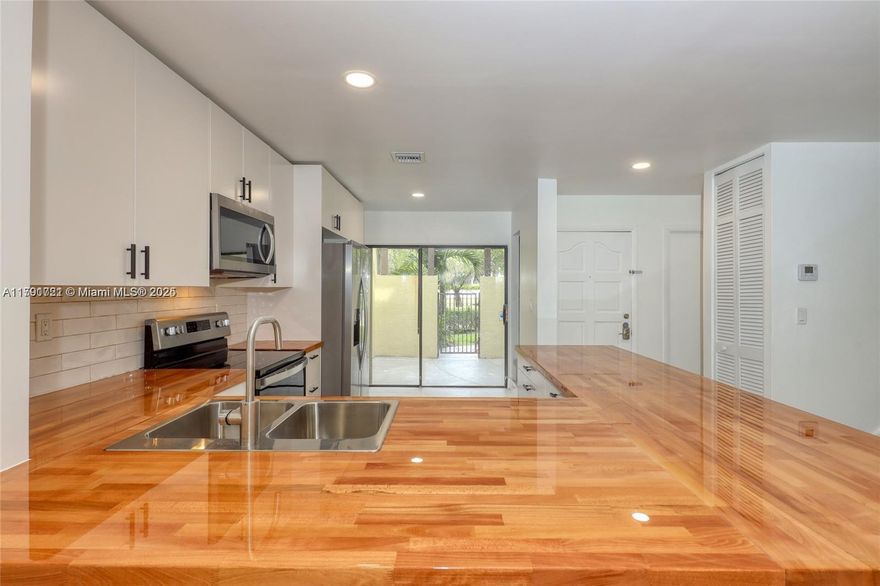 Welcome to this modern and beautifully renovated three-bedroom townhome. No expense was spared in the complete gutting and renovation of this home, which now boasts high-quality materials throughout. The open kitchen and designer bathrooms add a touch of luxury to this already stunning property. With three bedrooms, two and a half baths, a garage, and a spacious patio area offering golf course views, this home has it all. Located in a fantastic gated community, residents have access to amenities such as a golf course, tennis courts, pool, and playground. Don't miss out on this incredible opportunity - this home will rent quickly!