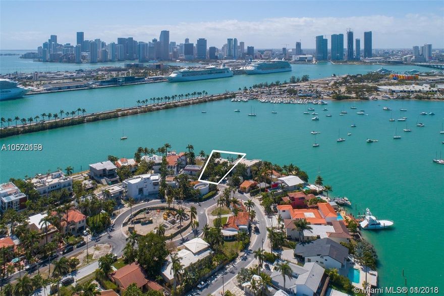 Rare Development opportunity on the tip of guard gated Palm Island. Lot features direct downtown views, 78feet&#xD;&#xA;of water frontage and a 50 foot dock. Own the best view in Miami Beach. Seller Financing available.