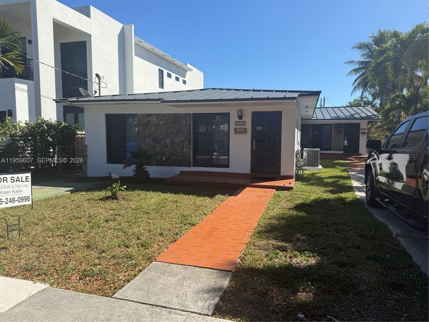 Exceptional opportunity to own a home in a highly desirable school district. This duplex has been beautifully converted into a spacious single-family residence with no detail overlooked. The home features 3 bedrooms plus an office and 3 bathrooms, with the master bathroom and closet fully remodeled. The property offers approximately 2,400sq.ft. of living space on a generous 7500sq.ft. lot, complete with a large storage shed in the backyard. The metal roof adds durability and longevity. Conveniently located just minutes from Coral Gables, Coconut Grove, and Brickell, this move-in ready home is waiting for you.