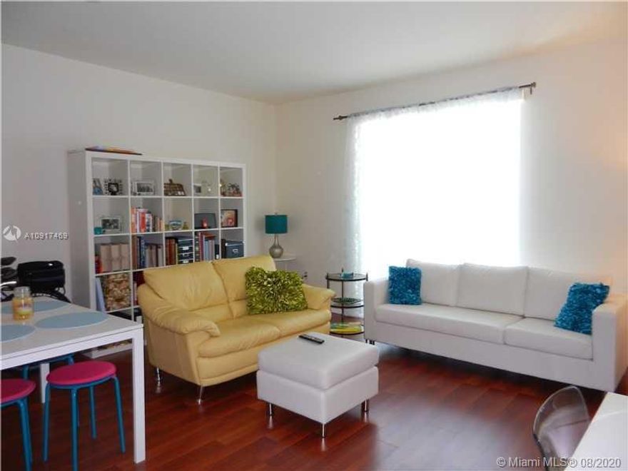 Beautifully upgraded 1 bedroom 1 full bath in centrally located Downtown Dadeland Condo. Light and bright. Sleek black granite countertops in fully equipped kitchen, wood laminate floors, walk-in closet, washer/dryer in unit. Spacious and attractive. Pet friendly under 20 lbs. Includes water, basic cable, internet, 1 assigned covered secured parking. Spectacular pool area and gym. Close to business, entertainment, airport, MetroRail and more. Easy to see. Easy to move in.