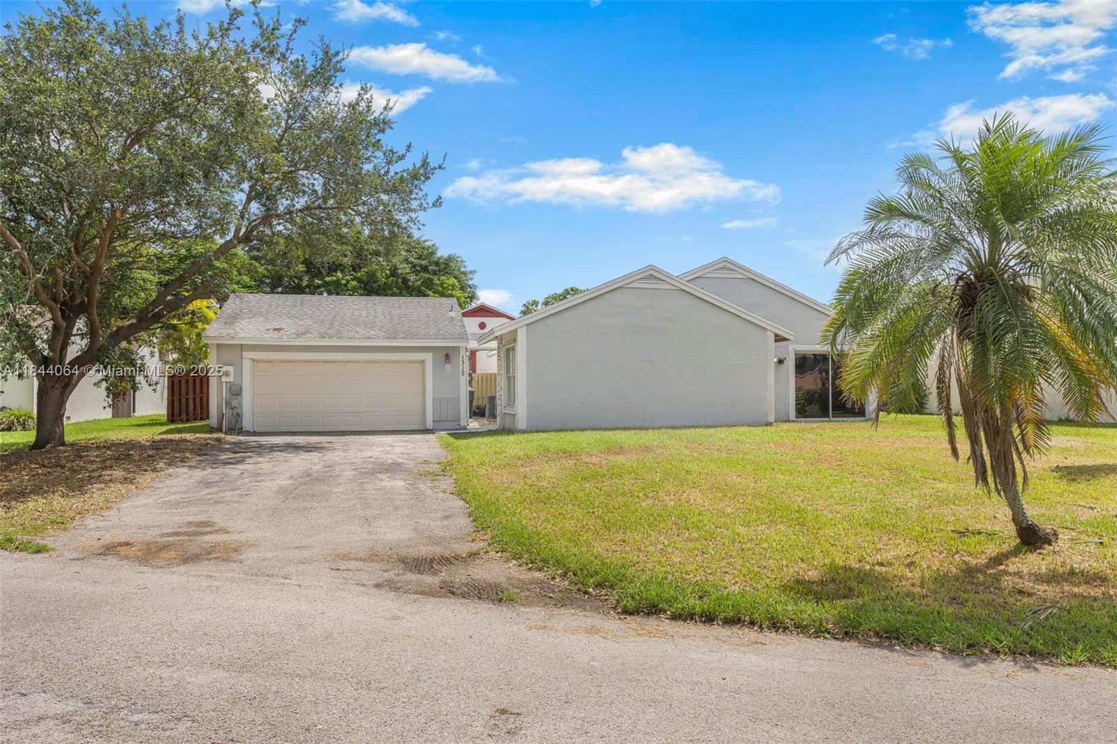 Welcome to this charming 2-bedroom, 2-bathroom single-story home in Homestead. Featuring vaulted ceilings and an open layout, the space feels bright and inviting. The well-appointed kitchen flows seamlessly into the living and dining areas—perfect for everyday living or entertaining. Enjoy the convenience of a spacious two-car garage and low HOA fees that add to the home’s value. Located in a quiet, well-kept community close to shops, schools, and parks, this home offers comfort, style, and practicality in one perfect package.