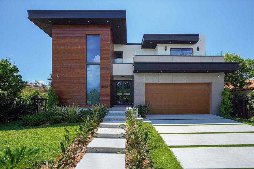 Introducing a newly constructed luxury home located in the heart of Miami Beach. This exquisite modern contemporary 2-story residence has been meticulously crafted with utmost care and attention to detail. Boasting 5 BD, 4.5 BA, and 3,961 SF, the open floor plan with 10ft ceilings and expansive sliding doors seamlessly connects the indoor and outdoor spaces. Spacious backyard and additional 1,900 SF of outdoor terrace & garage. The kitchen is a chef's dream, featuring Brazilian quartzite countertops, a large cooking island, dual oven, sink, and dishwasher. The thoughtfully designed layout ensures both functionality and style. The primary bedroom is a retreat, complete with two spacious terraces, a walk-in closet, and a spa-like bathroom. Situated in a highly sought-after location.